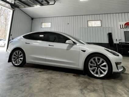 White SUV with ceramic tint at Extreme Tint