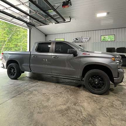 Vehicle with dark window film