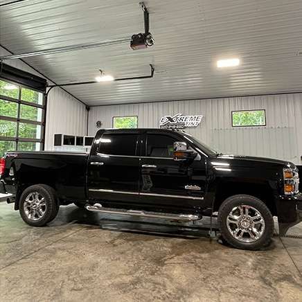 Vehicle with window tint in the shop